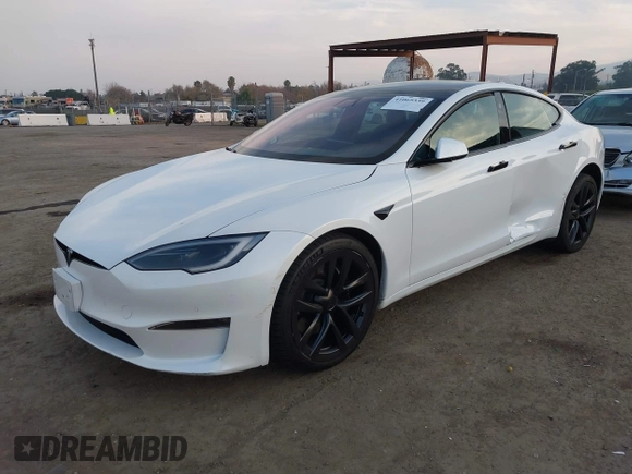2022 Tesla Model S with VIN 5YJSA1E57NF483768, listed as a IAAI auction lot 41069339 with 35,342 mi miles and . Bid and sale history available at DreamBid. Image 2.