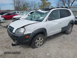2006 Hyundai Tucson GLS with VIN KM8JN72D26U322893, listed as a IAAI auction lot 41882842 with 116,972 mi miles. Bid and sale history available at carsss.com. Image 2.