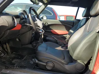 2013 MINI Convertible with VIN WMWZN3C58DT265980, listed as a Copart auction lot 77157154 with 88,975 mi miles and Salvage title. Bid and sale history available at DreamBid. Image 7.