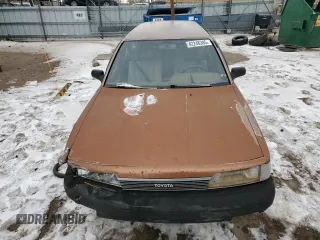 1989 Toyota Camry z VIN JT2SV21W5K0240987, wystawiony jako Copart lot #42248385 z przebiegiem 246 651 mil mil oraz Czysty tytuł • Clean title. Historia ofert i sprzedaży dostępna na DreamBid. Obrazek 12.