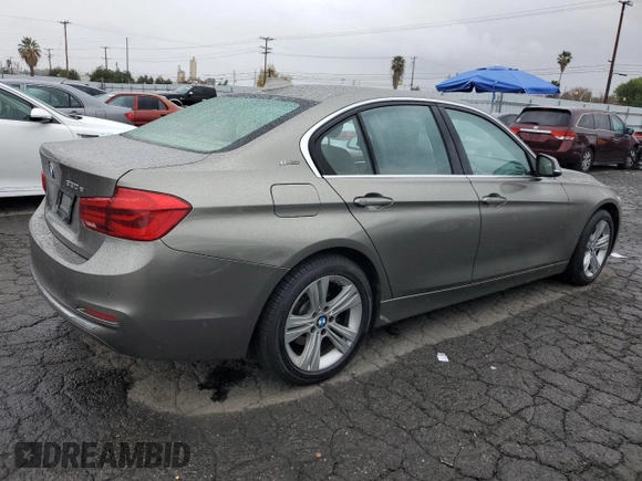 2016 BMW 3 Series 330e iPerformance with VIN WBA8E1C57GK479837, listed as a Copart auction lot 42877554 with 72,443 mi miles. Bid and sale history available at carsss.com. Image 3.