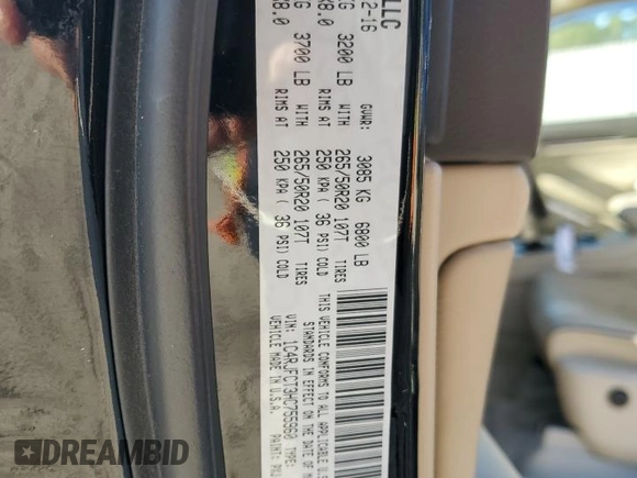 2017 Jeep Grand Cherokee Overland with VIN 1C4RJFCT3HC755960, listed as a Copart auction lot 52268895 with 99,998 mi miles and Salvage title. Bid and sale history available at DreamBid. Image 13.