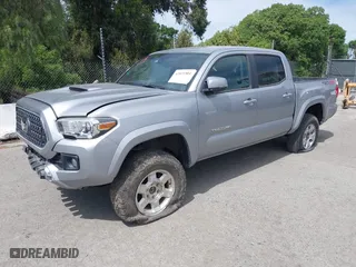 2019 Toyota Tacoma 4WD SR with VIN 3TMCZ5AN4KM194526, listed as a IAAI auction lot 42021504 with 87,767 mi miles. Bid and sale history available at carsss.com. Image 17.