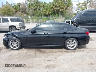 2013 BMW 5 Series 528i with VIN WBAXG5C51DDY33333, listed as a IAAI auction lot 41685179 with 94,936 mi miles and . Bid and sale history available at carsss.com. Image 14.