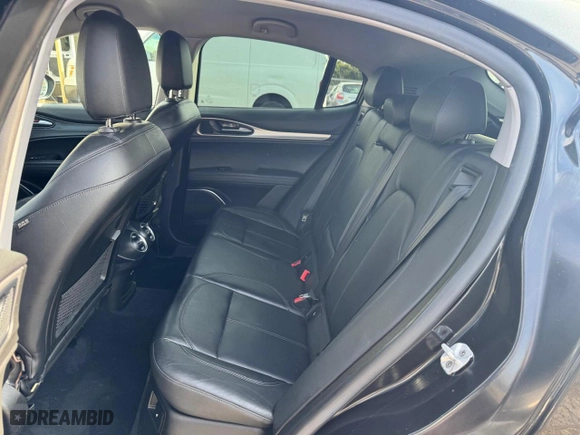2018 Alfa Romeo Stelvio Sport with VIN ZASFAKPN2J7B59011, listed as a Copart auction lot 51618575 with 70,138 mi miles and Clean Title. Bid and sale history available at carsss.com. Image 6.
