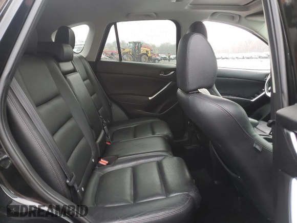 2016 Mazda CX-5 Grand Touring with VIN JM3KE4DYXG0711367, listed as a Copart auction lot 52862405 with 87,870 mi miles and Salvage Title. Bid and sale history available at DreamBid. Image 10.