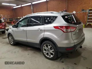 2014 Ford Escape Titanium с VIN 1FMCU0J94EUD41993, выставлен на аукционе Copart как лот 56933605 с пробегом 104 011 миль миль и Списание • Salvage title. История ставок и продаж доступна на DreamBid. Изображение 2.