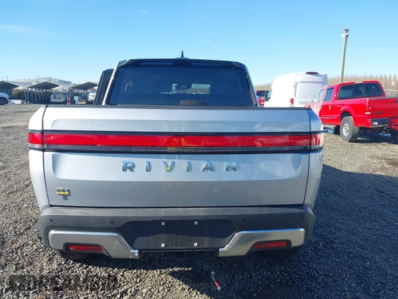 2023 Rivian R1T Adventure with VIN 7FCTGAAA0PN021864, listed as a IAAI auction lot 41620630 with 1 mi miles. Bid and sale history available at carsss.com. Image 16.