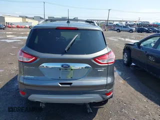 2014 Ford Escape Titanium with VIN 1FMCU9J99EUA75276, listed as a IAAI auction lot 42148537 with 163,330 mi miles and . Bid and sale history available at DreamBid. Image 16.