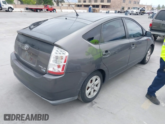 2007 Toyota Prius z VIN JTDKB20U573236900, wystawiony jako IAAI lot #42375325 z przebiegiem Nie podano mil oraz . Historia ofert i sprzedaży dostępna na DreamBid. Obrazek 4.