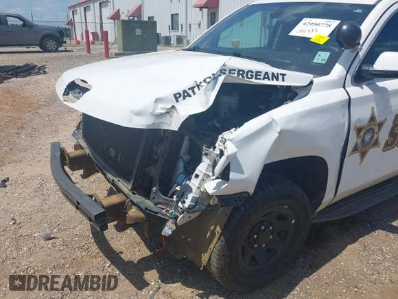 2020 Chevrolet Tahoe Commercial with VIN 1GNLCDECXLR154849, listed as a IAAI auction lot 42050778 with 124,771 mi miles and . Bid and sale history available at DreamBid. Image 20.
