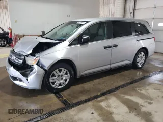 2012 Honda Odyssey LX z VIN 5FNRL5H29CB077425, wystawiony jako Copart lot #57705915 z przebiegiem 133 819 mil mil oraz Szkoda całkowita • Salvage title. Historia ofert i sprzedaży dostępna na DreamBid. Obrazek 1.