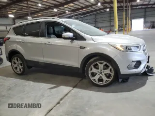 2019 Ford Escape Titanium with VIN 1FMCU0J96KUB77741, listed as a Copart auction lot 57517325 with 90,002 mi miles and Non repairable. Bid and sale history available at DreamBid. Image 4.