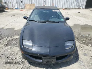 1998 Pontiac Sunfire z VIN 4G2JB32T1WB201350, wystawiony jako Copart lot #53074805 z przebiegiem 128 486 mil mil oraz Szkody całkowita. Historia ofert i sprzedaży dostępna na DreamBid. Obrazek 5.