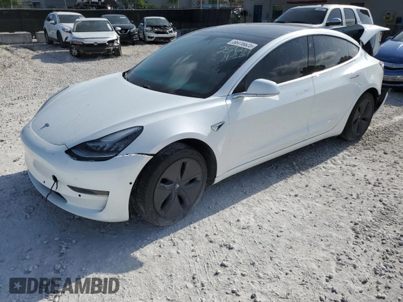 2020 Tesla Model 3 Standard Range Plus z VIN 5YJ3E1EA3LF632566, wystawiony jako Copart lot #56416625 z przebiegiem Nie podano mil oraz Nie do naprawy • Non repairable. Historia ofert i sprzedaży dostępna na DreamBid. Obrazek 1.