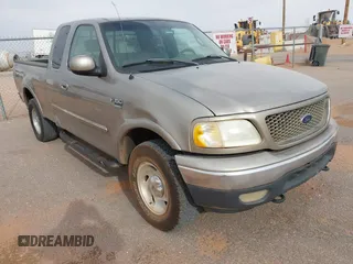 2001 Ford F-150 XL with VIN 2FTRX18L61CA36907, listed as a IAAI auction lot 41906933 with 317,857 mi miles. Bid and sale history available at carsss.com. Image 1.