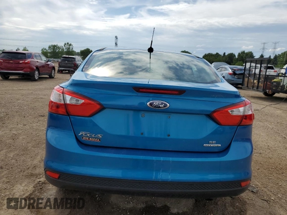 2013 Ford Focus SE with VIN 1FADP3F23DL208259, listed as a Copart auction lot 62009465 with 218,363 mi miles and Salvage title. Bid and sale history available at DreamBid. Image 6.