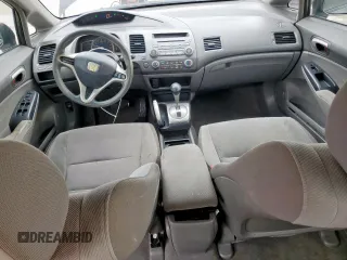 2010 Honda Civic LX with VIN 2HGFA1F52AH315977, listed as a Copart auction lot 54240115 with 217,883 mi miles and Salvage Title. Bid and sale history available at DreamBid. Image 8.