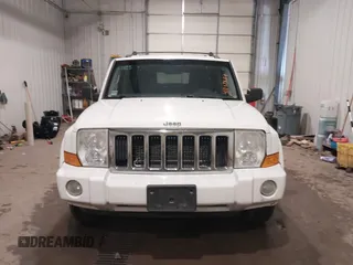 2010 Jeep Commander Sport z VIN 1J4RG4GK7AC132121, wystawiony jako IAAI lot #41187854 z przebiegiem 155 413 mil mil oraz . Historia ofert i sprzedaży dostępna na DreamBid. Obrazek 13.