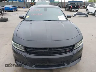 2019 Dodge Charger SXT with VIN 2C3CDXBG2KH579435, listed as a IAAI auction lot 41934441 with 116,983 mi miles and . Bid and sale history available at DreamBid. Image 6.