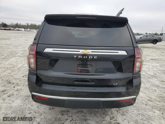 2021 Chevrolet Tahoe LT with VIN 1GNSCNKD6MR130449, listed as a Copart auction lot 83412174 with 60,598 mi miles and Salvage Title. Bid and sale history available at carsss.com. Image 6.