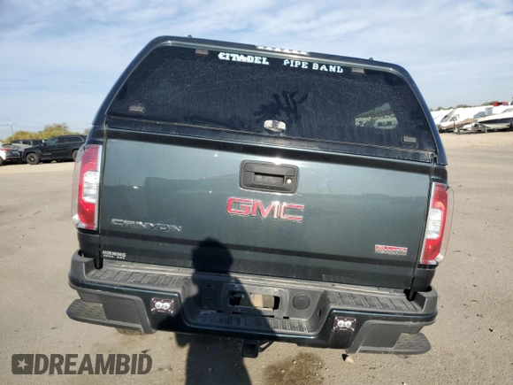 2017 GMC Canyon z VIN 1GTP6CE1XH1252005, wystawiony jako Copart lot #74982794 z przebiegiem 62 797 mil mil oraz Szkoda całkowita • Salvage title. Historia ofert i sprzedaży dostępna na DreamBid. Obrazek 6.
