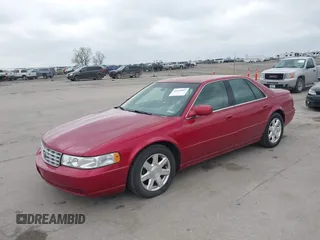 2001 Cadillac Seville z VIN 1G8KS54Y91U227846, wystawiony jako IAAI lot #42134095 z przebiegiem 216 766 mil mil oraz . Historia ofert i sprzedaży dostępna na DreamBid. Obrazek 19.