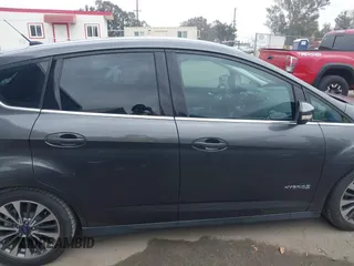 2018 Ford C-Max Titanium with VIN 1FADP5DU4JL105072, listed as a IAAI auction lot 42110522 with 93,176 mi miles and . Bid and sale history available at DreamBid. Image 13.