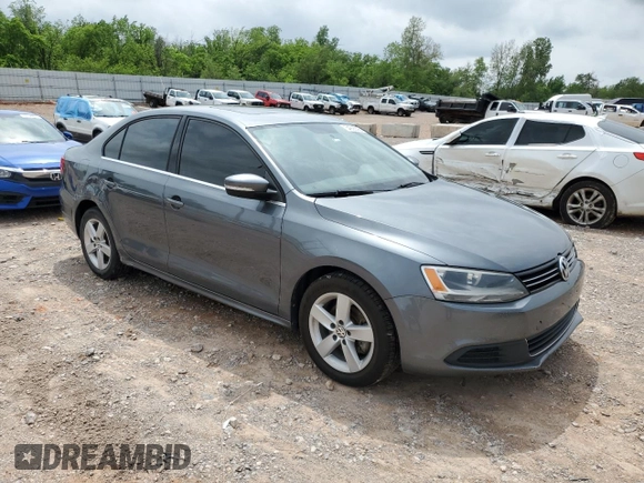 2014 Volkswagen Jetta TDI w/Premium with VIN 3VWLL7AJ7EM313598, listed as a Copart auction lot 54905595 with 162,036 mi miles and Salvage title. Bid and sale history available at DreamBid. Image 4.