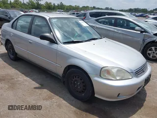 2000 Honda Civic VP with VIN 2HGEJ661XYH590562, listed as a IAAI auction lot 42088612 with 236,202 mi miles. Bid and sale history available at carsss.com. Image 1.