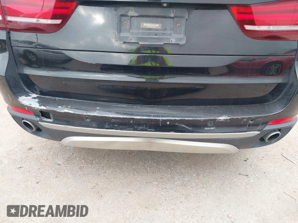2014 BMW X5 xDrive35d with VIN 5UXKS4C56E0J93861, listed as a IAAI auction lot 41906775 with 149,263 mi miles. Bid and sale history available at carsss.com. Image 17.