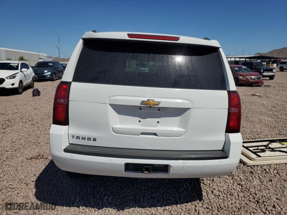 2018 Chevrolet Tahoe LS with VIN 1GNSKAKC6JR258527, listed as a Copart auction lot 71314804 with 69,040 mi miles and Salvage Title. Bid and sale history available at carsss.com. Image 6.