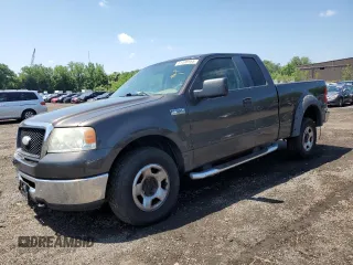 2007 Ford F-150 STX with VIN 1FTRX14W37FB62767, listed as a Copart auction lot 61408955 with 219,821 mi miles and Salvage title. Bid and sale history available at DreamBid. Image 1.
