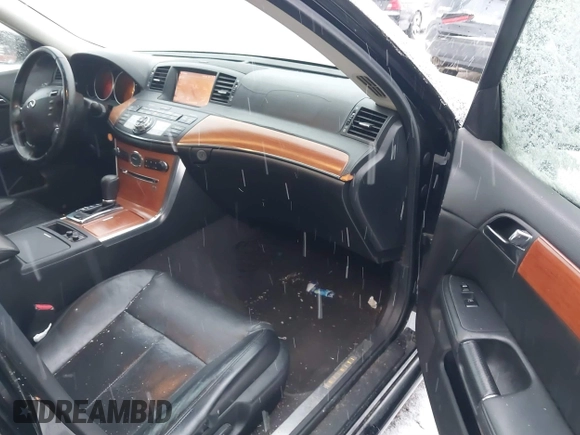 2006 Infiniti M z VIN JNKAY01E46M114297, wystawiony jako IAAI lot #41301675 z przebiegiem 199 013 mil mil oraz . Historia ofert i sprzedaży dostępna na DreamBid. Obrazek 5.