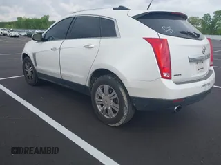 2014 Cadillac SRX Luxury Collection with VIN 3GYFNBE36ES519705, listed as a IAAI auction lot 42069288 with 211,632 mi miles and . Bid and sale history available at carsss.com. Image 3.