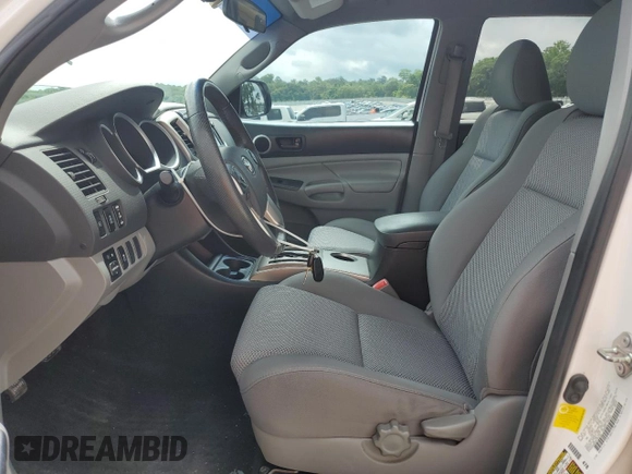 2014 Toyota Tacoma PreRunner с VIN 3TMJU4GN2EM169152, выставлен на аукционе Copart как лот 58742885 с пробегом 147 674 миль миль и Списание • Salvage title. История ставок и продаж доступна на DreamBid. Изображение 7.