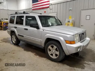 2006 Jeep Commander with VIN 1J8HG48N86C275203, listed as a Copart auction lot 57827085 with 197,552 mi miles and Clean title. Bid and sale history available at DreamBid. Image 4.