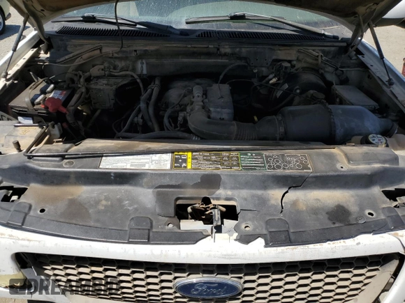 2003 Ford F-150 XL with VIN 2FTRX17213CA05950, listed as a Copart auction lot 54435115 with 310,503 mi miles and Salvage title. Bid and sale history available at DreamBid. Image 11.