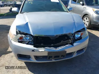 2004 Acura TSX w/Navigation with VIN JH4CL96984C024774, listed as a IAAI auction lot 41835524 with 189,924 mi miles and . Bid and sale history available at DreamBid. Image 6.