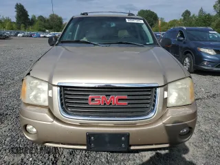2005 GMC Envoy SLT with VIN 1GKDS13S552135280, listed as a Copart auction lot 68097344 with 165,924 mi miles and Salvage Title. Bid and sale history available at carsss.com. Image 5.