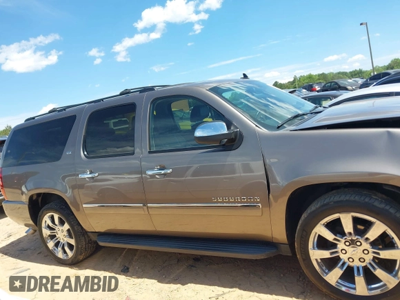 2011 Chevrolet Suburban LTZ with VIN 1GNSKKE3XBR394436, listed as a IAAI auction lot 42324225 with 132,871 mi miles and . Bid and sale history available at DreamBid. Image 13.