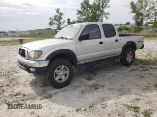 2002 Toyota Tacoma PreRunner with VIN 5TEGN92N92Z894290, listed as a Copart auction lot 55474985 with 213,913 mi miles and Salvage title. Bid and sale history available at DreamBid. Image 1.