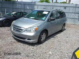 2007 Honda Odyssey EX-L z VIN 5FNRL38717B012462, wystawiony jako IAAI lot #42388885 z przebiegiem 166 861 mil mil oraz . Historia ofert i sprzedaży dostępna na DreamBid. Obrazek 2.