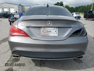 2014 Mercedes-Benz CLA 250 with VIN WDDSJ4GBXEN133966, listed as a Copart auction lot 59897715 with 100,509 mi miles and Salvage title. Bid and sale history available at DreamBid. Image 6.