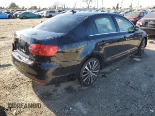 2014 Volkswagen Jetta SE z VIN 3VWD17AJXEM374051, wystawiony jako Copart lot #50261485 z przebiegiem 138 282 mil mil oraz Szkoda całkowita • Salvage title. Historia ofert i sprzedaży dostępna na DreamBid. Obrazek 3.