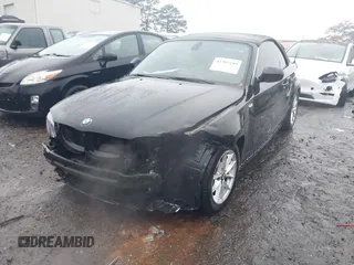 2011 BMW 1 Series 128i with VIN WBAUL7C52BVM79176, listed as a IAAI auction lot 41387249 with 99,145 mi miles and . Bid and sale history available at carsss.com. Image 19.