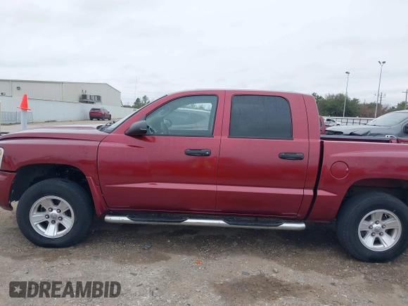 2006 Dodge Dakota SLT with VIN 1D7HE48KX6S598831, listed as a IAAI auction lot 41292884 with 173,181 mi miles and . Bid and sale history available at carsss.com. Image 14.