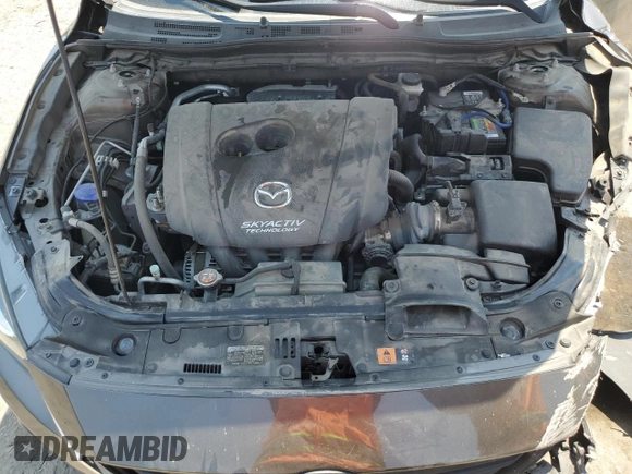 2015 Mazda 3 i Sport z VIN 3MZBM1K77FM124850, wystawiony jako Copart lot #64770645 z przebiegiem 91 485 mil mil oraz Szkoda całkowita • Salvage title. Historia ofert i sprzedaży dostępna na DreamBid. Obrazek 11.