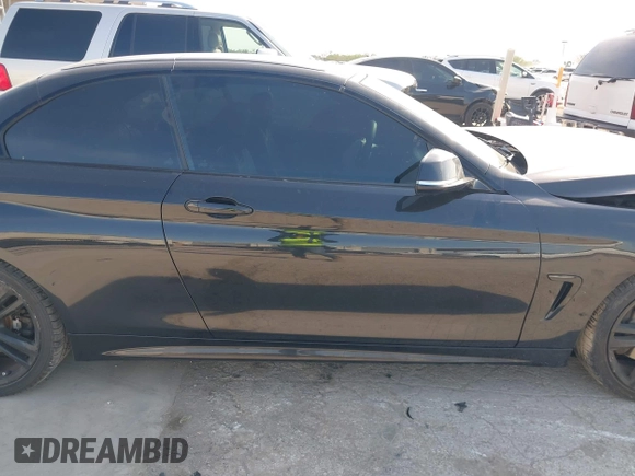 2014 BMW 4 Series 435i with VIN WBA3T3C59EP737612, listed as a IAAI auction lot 42260394 with 104,877 mi miles and . Bid and sale history available at DreamBid. Image 13.