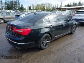 2014 Kia Cadenza Premium with VIN KNALN4D71E5132396, listed as a IAAI auction lot 41977031 with 114,714 mi miles. Bid and sale history available at carsss.com. Image 4.